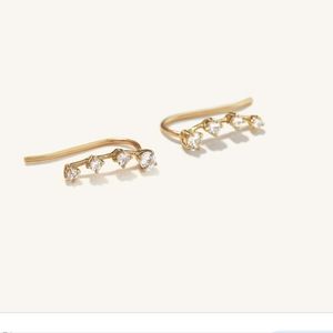 Mejuri - 14k gold with white sapphire climbers